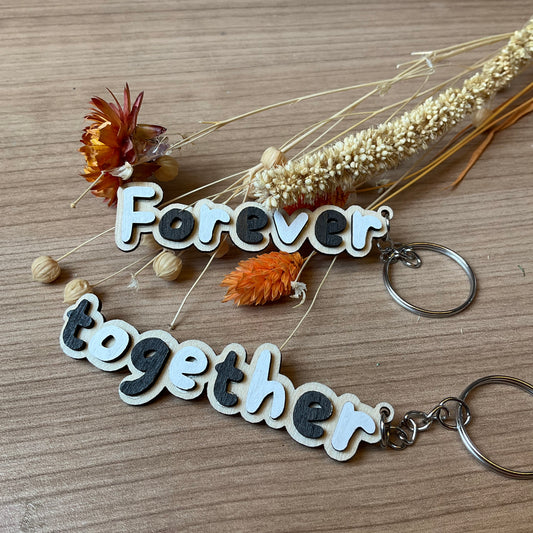 Set sleutelhangers ‘Forever’ en ‘together’ zwart/wit